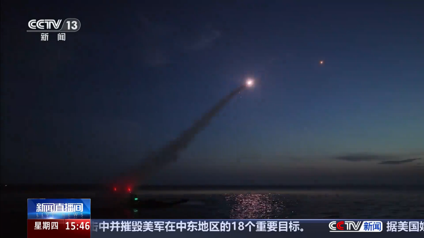 A MANPADS team on a Type-05 APC launches an HN-6B missile toward a target drone